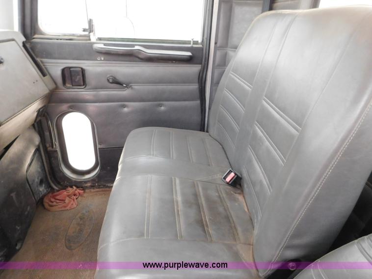 image for item L5932 2001 Peterbilt 330 digger derrick truck