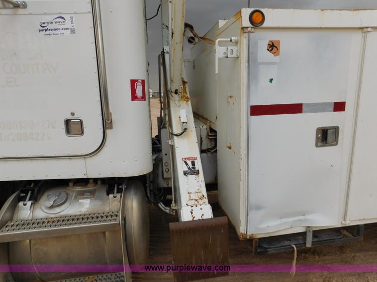 image for item L5932 2001 Peterbilt 330 digger derrick truck