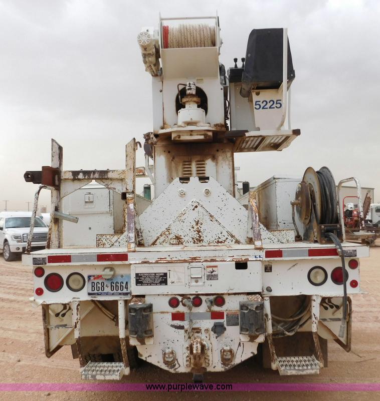 image for item L5932 2001 Peterbilt 330 digger derrick truck