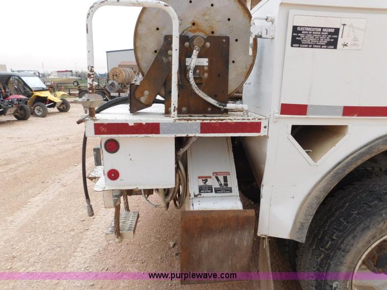 image for item L5932 2001 Peterbilt 330 digger derrick truck