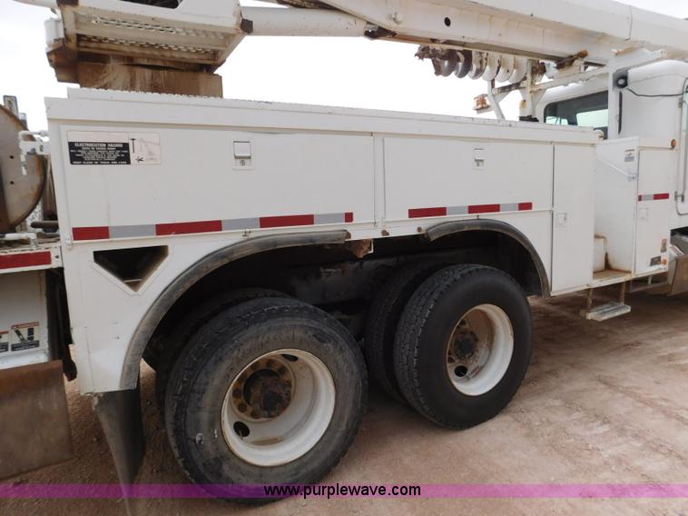 image for item L5932 2001 Peterbilt 330 digger derrick truck