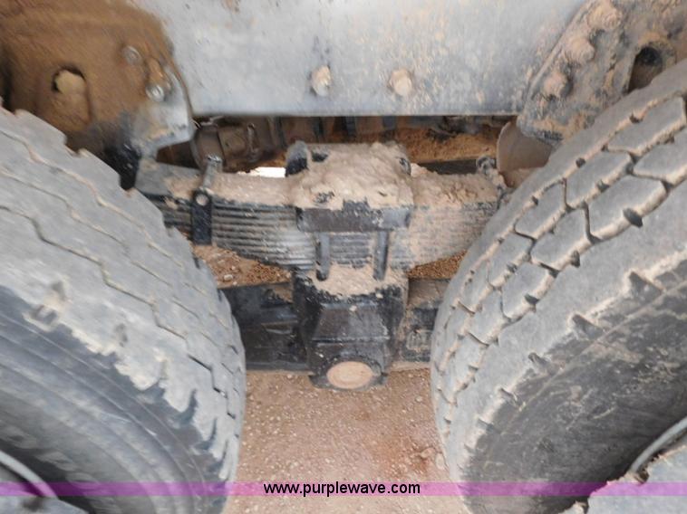 image for item L5932 2001 Peterbilt 330 digger derrick truck