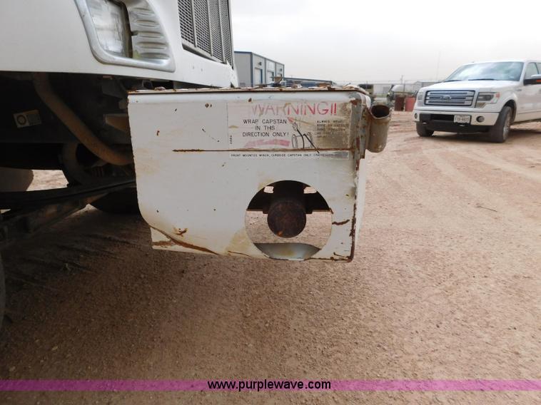 image for item L5932 2001 Peterbilt 330 digger derrick truck