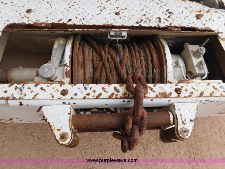 image for item L5932 2001 Peterbilt 330 digger derrick truck