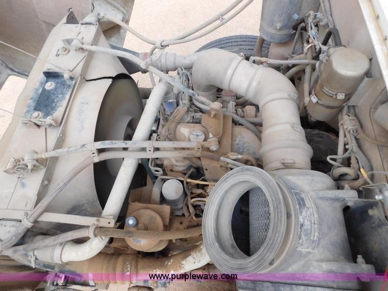 image for item L5932 2001 Peterbilt 330 digger derrick truck