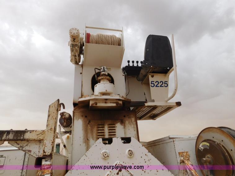 image for item L5932 2001 Peterbilt 330 digger derrick truck