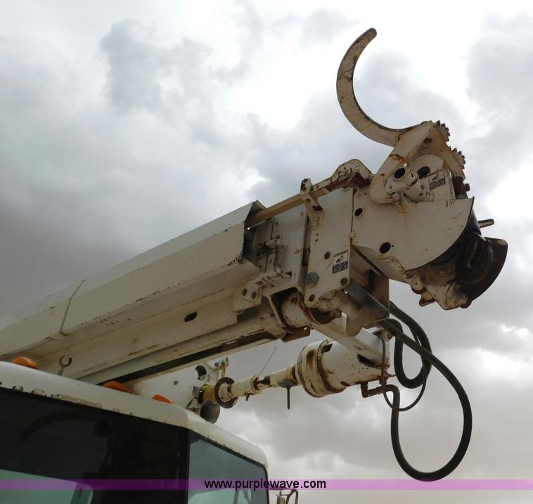 image for item L5932 2001 Peterbilt 330 digger derrick truck