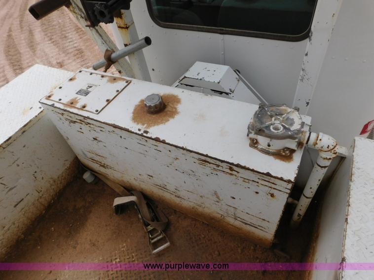 image for item L5932 2001 Peterbilt 330 digger derrick truck