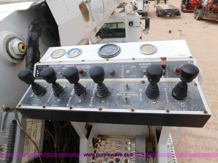 image for item L5932 2001 Peterbilt 330 digger derrick truck