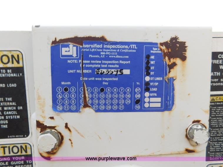 image for item L5932 2001 Peterbilt 330 digger derrick truck