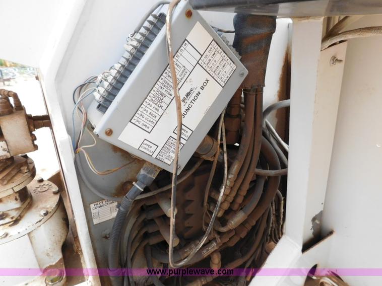 image for item L5932 2001 Peterbilt 330 digger derrick truck