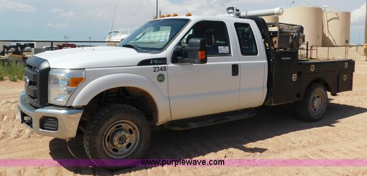 image for item L5938 2013 Ford F350 Super Duty SuperCab service truck with crane