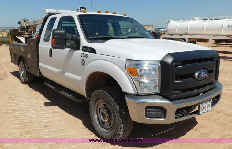 image for item L5938 2013 Ford F350 Super Duty SuperCab service truck with crane