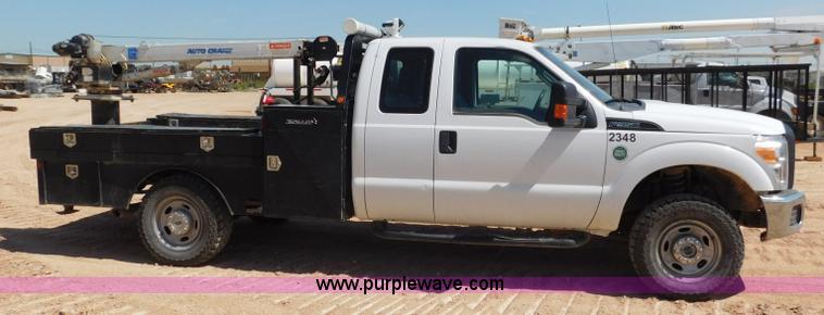 image for item L5938 2013 Ford F350 Super Duty SuperCab service truck with crane