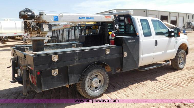 image for item L5938 2013 Ford F350 Super Duty SuperCab service truck with crane