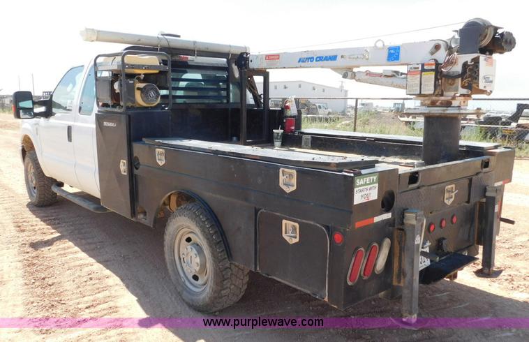 image for item L5938 2013 Ford F350 Super Duty SuperCab service truck with crane
