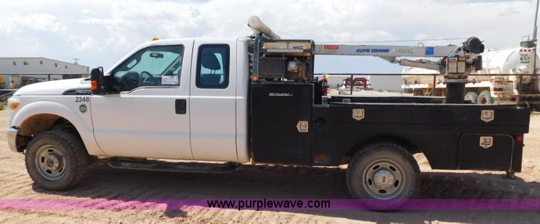 image for item L5938 2013 Ford F350 Super Duty SuperCab service truck with crane