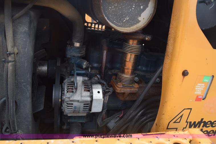 image for item CB9367 1999 Case 560 trencher