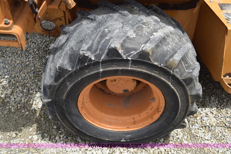 image for item CB9367 1999 Case 560 trencher