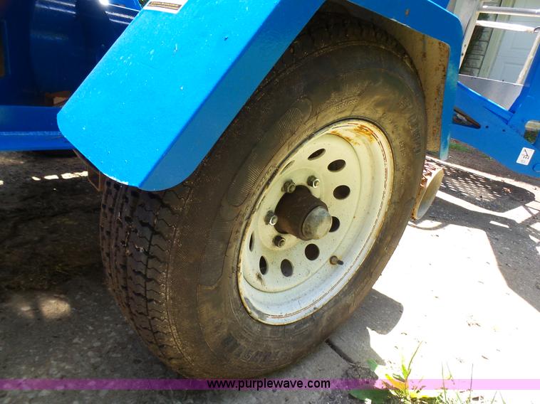 image for item L7083 2005 Genie TZ-50 towable boom lift