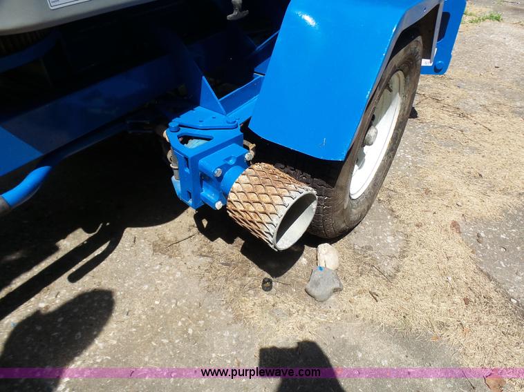 image for item L7083 2005 Genie TZ-50 towable boom lift