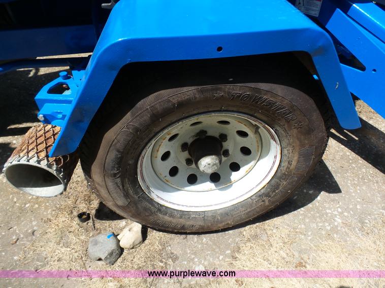 image for item L7083 2005 Genie TZ-50 towable boom lift