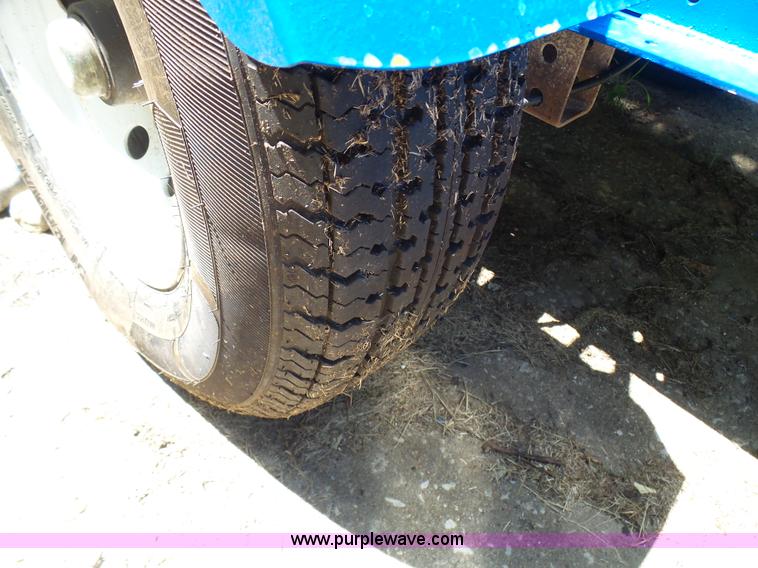 image for item L7083 2005 Genie TZ-50 towable boom lift