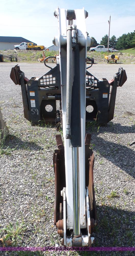 image for item L6802 Bobcat 8811 backhoe skid steer attachment