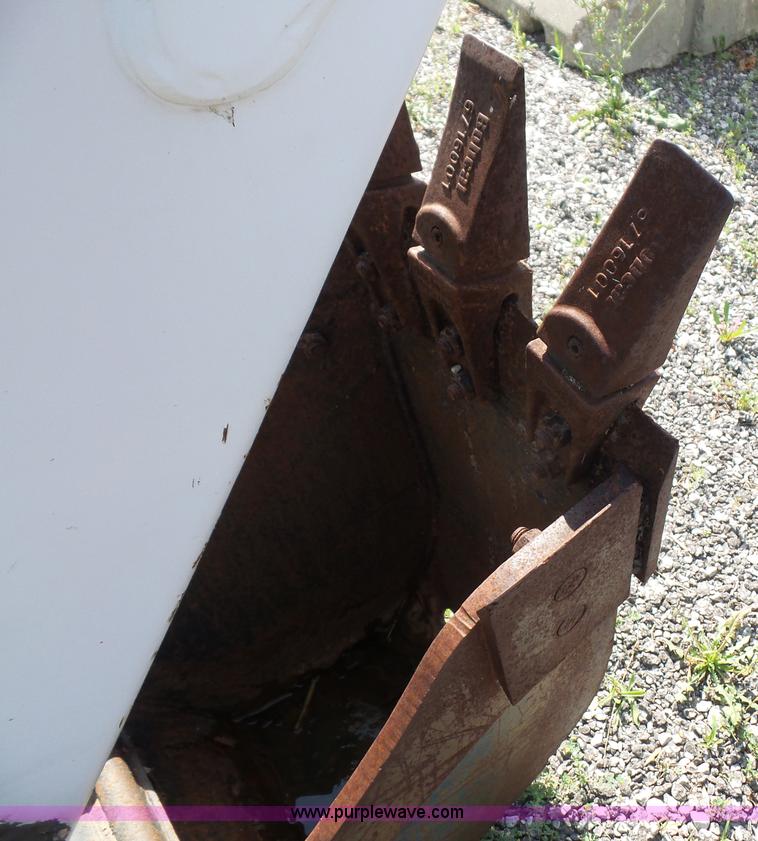 image for item L6802 Bobcat 8811 backhoe skid steer attachment