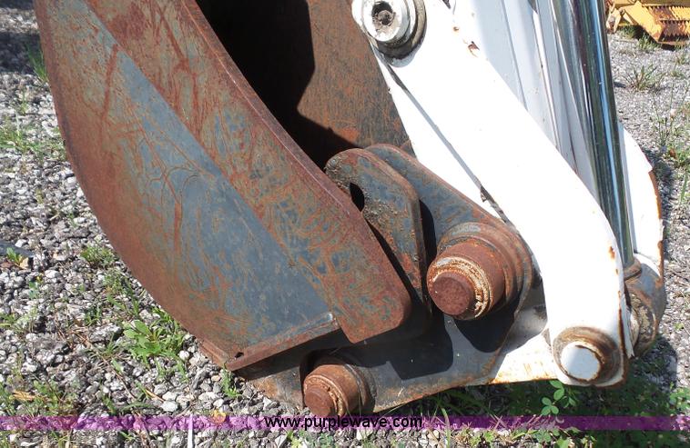 image for item L6802 Bobcat 8811 backhoe skid steer attachment