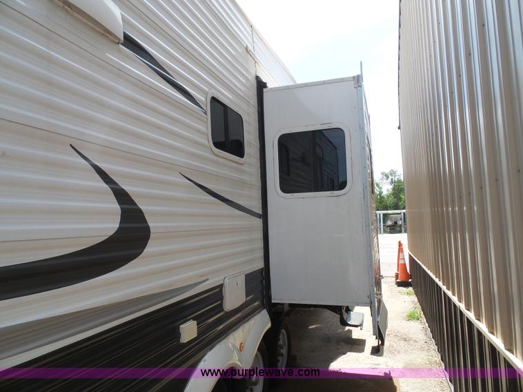 image for item J4833 2013 Monte Carlo Platinum Edition camper