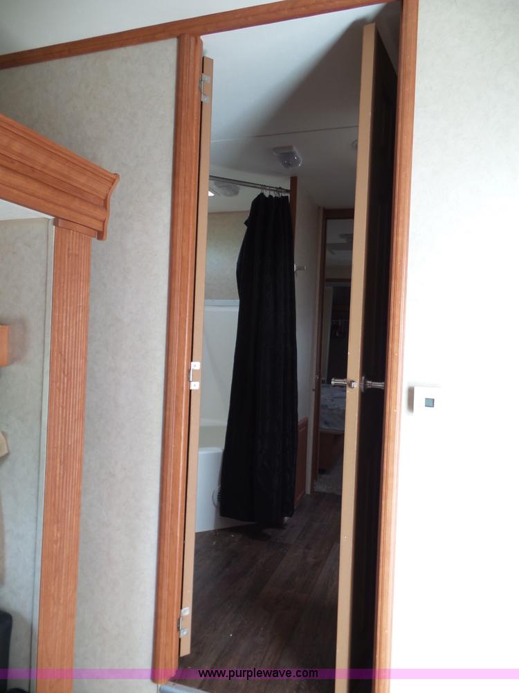 image for item J4833 2013 Monte Carlo Platinum Edition camper