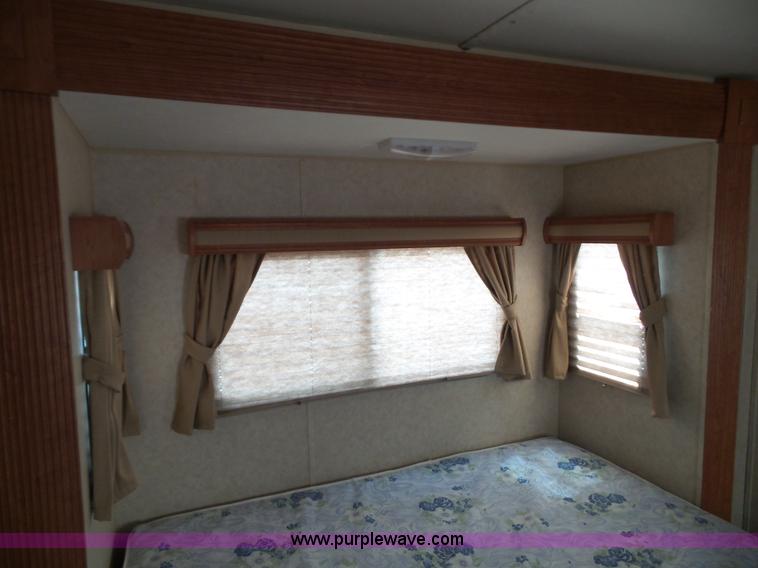 image for item J4833 2013 Monte Carlo Platinum Edition camper