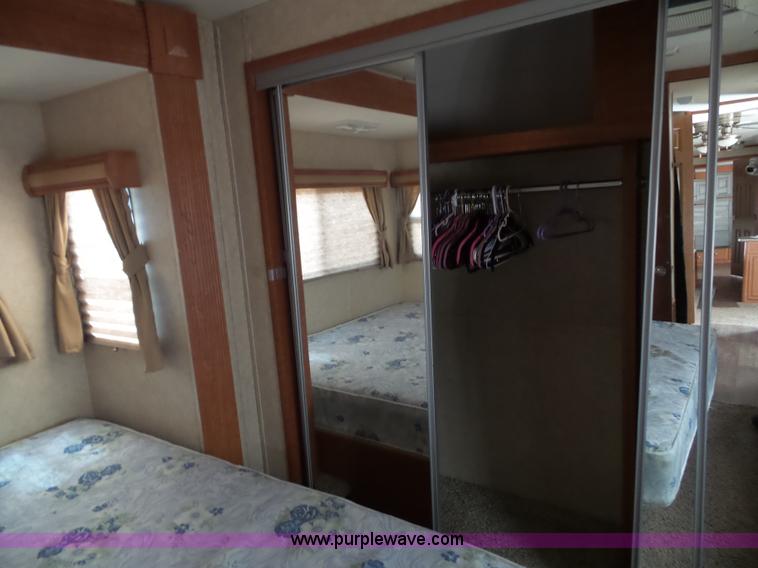 image for item J4833 2013 Monte Carlo Platinum Edition camper