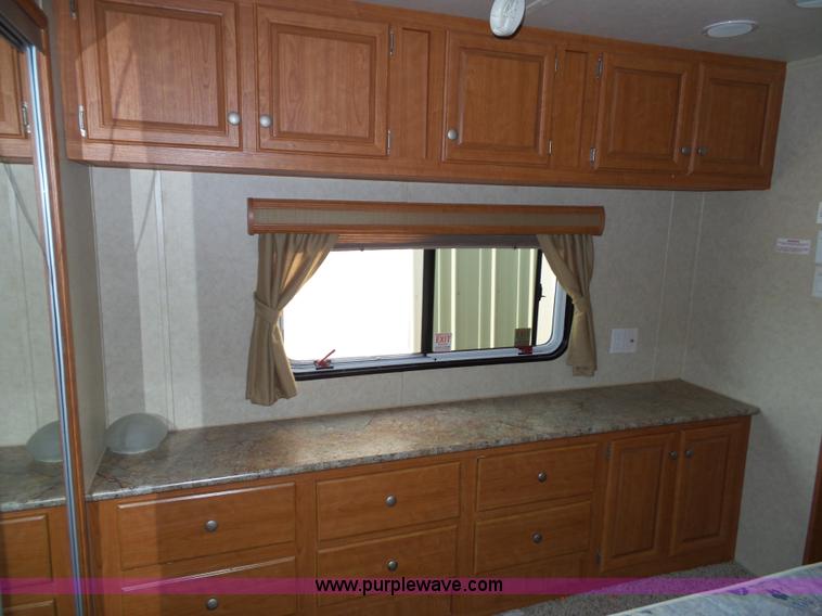 image for item J4833 2013 Monte Carlo Platinum Edition camper