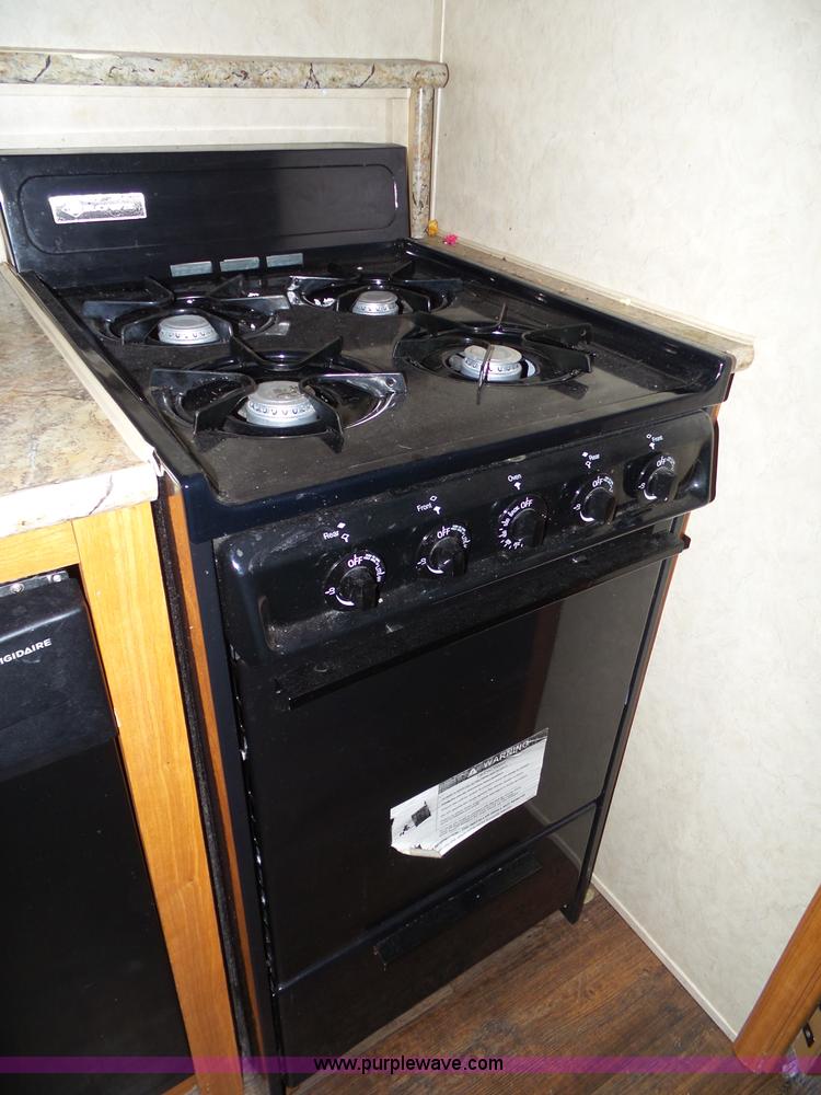 image for item J4833 2013 Monte Carlo Platinum Edition camper