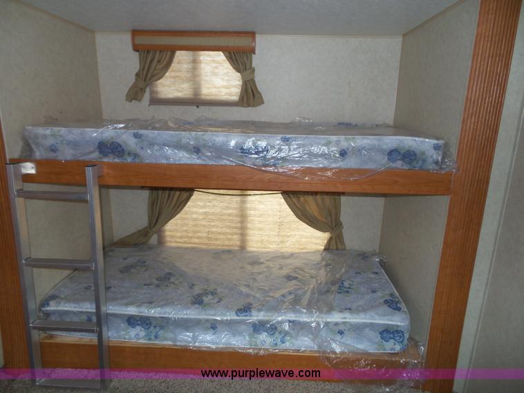 image for item J4833 2013 Monte Carlo Platinum Edition camper