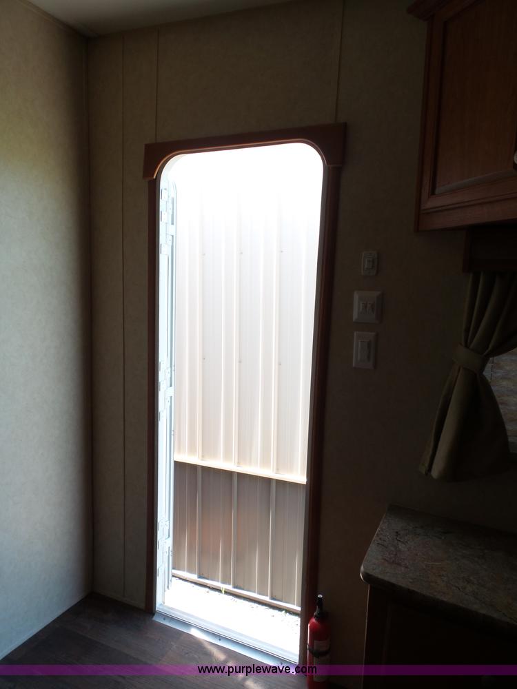 image for item J4833 2013 Monte Carlo Platinum Edition camper