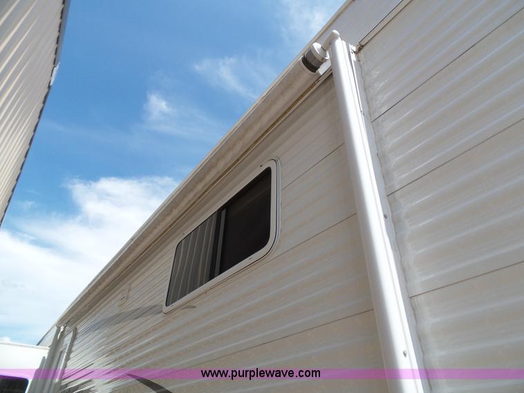 image for item J4833 2013 Monte Carlo Platinum Edition camper