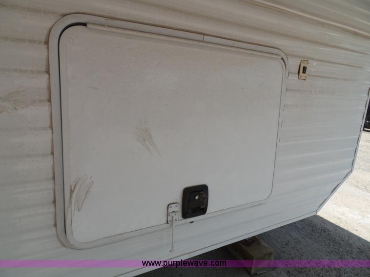 image for item J4833 2013 Monte Carlo Platinum Edition camper