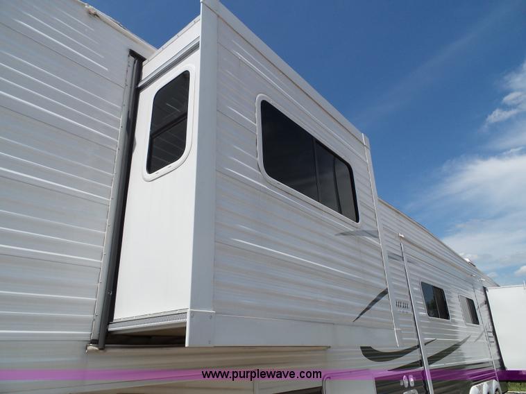 image for item J4833 2013 Monte Carlo Platinum Edition camper