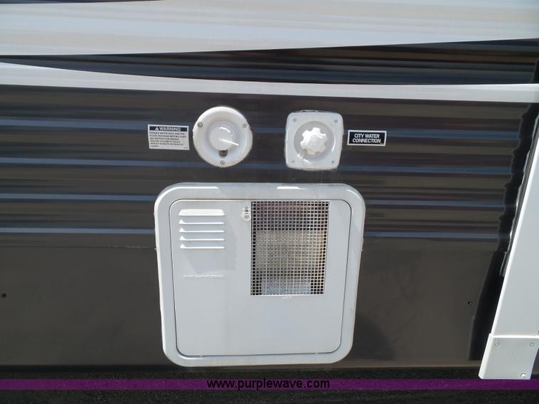 image for item J4833 2013 Monte Carlo Platinum Edition camper