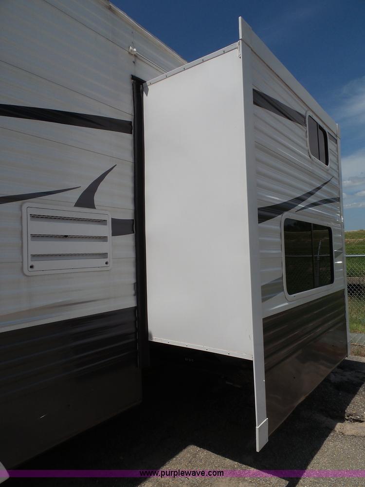 image for item J4833 2013 Monte Carlo Platinum Edition camper