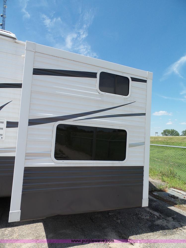 image for item J4833 2013 Monte Carlo Platinum Edition camper