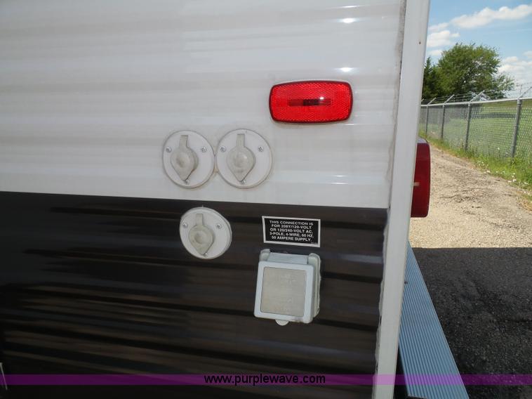 image for item J4833 2013 Monte Carlo Platinum Edition camper