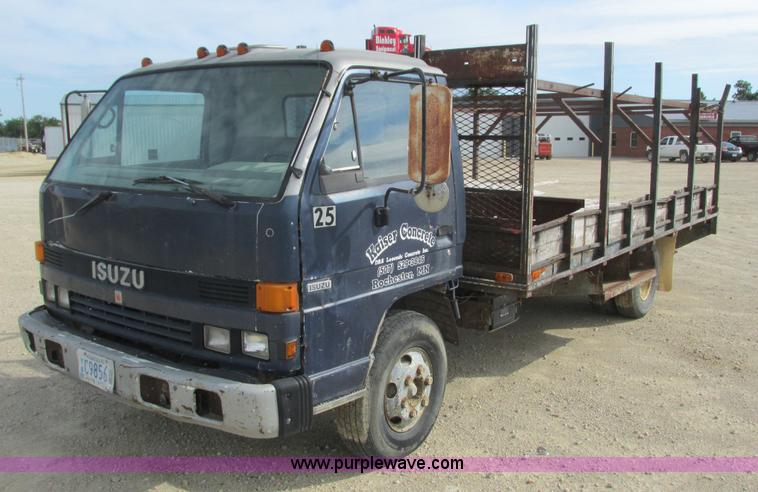 image for item K4057 1990 Isuzu NPR flatbed truck