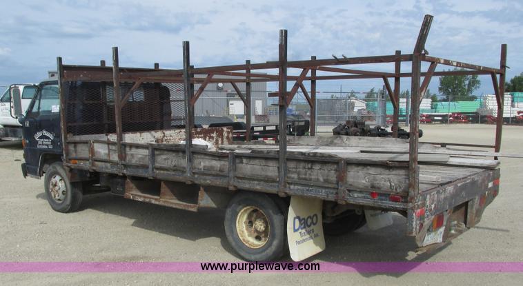 image for item K4057 1990 Isuzu NPR flatbed truck
