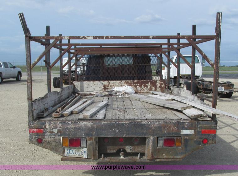 image for item K4057 1990 Isuzu NPR flatbed truck