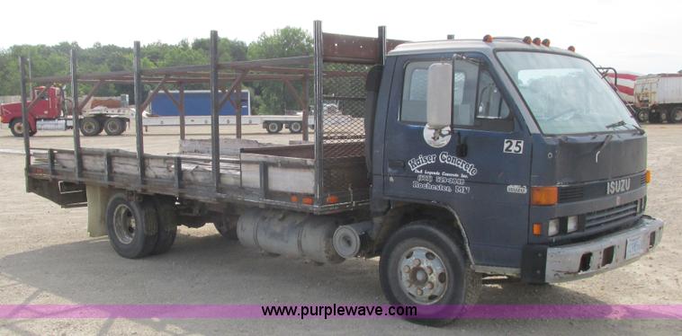 image for item K4057 1990 Isuzu NPR flatbed truck