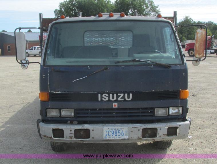 image for item K4057 1990 Isuzu NPR flatbed truck